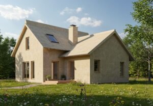 A small hempcrete house with earthy-toned walls, large windows, and a pitched roof, surrounded by wildflowers, showcasing sustainable building materials.