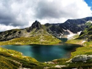 "Remote mountain lake ideal for off grid living in Bulgaria's pristine wilderness"