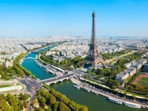 "Paris cityscape contrasting with French rural off grid living possibilities" 