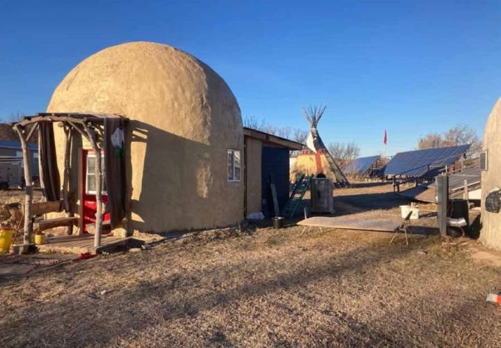 ustainable dome houses at Pine Ridge Reservation showcasing eco-friendly and energy-efficient housing solutions for community resilience.